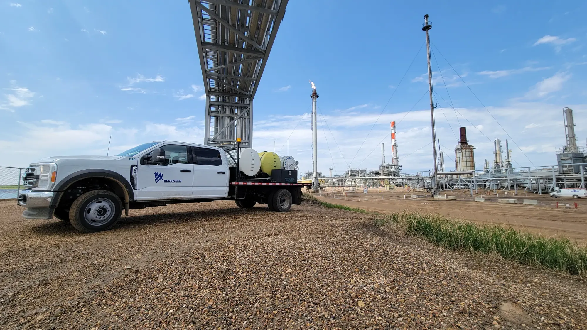 Blueweed truck 810 on industrial site